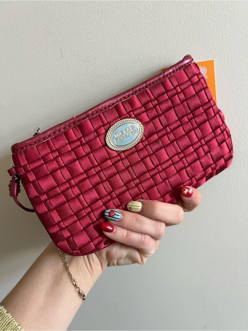 The Sak Pink-Red Woven Wristlet Clutch